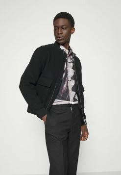 J.LINDEBERG SASHA COMMUTER - Trousers - Black 9 J.LINDEBERG SASHA COMMUTER - Trousers - Black -J.LINDEBERG SHOP 252fe711d3a64afcb22bd5b6fe1a1e6a