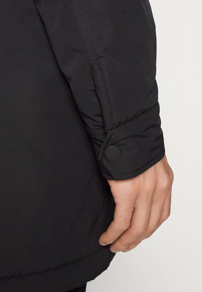 HOLLIS TECH PADDED COAT - Classic coat - black