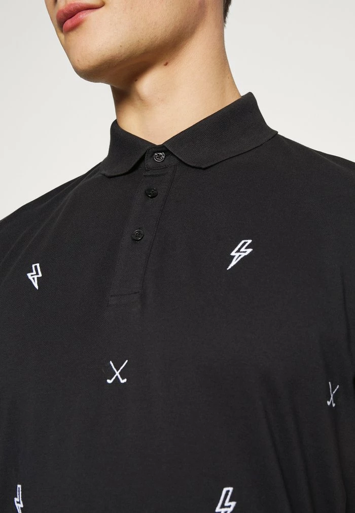 STRIKE - Polo shirt - black