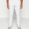 J.LINDEBERG ACTIVE ARGYLE GOLF - Trousers - White