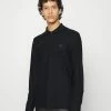 J.LINDEBERG DEVON LONG SLEEVE - Polo Shirt - Black